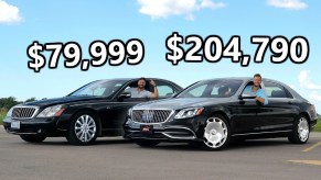 A black 2007 Maybach 57s next to a silver-and-black 2020 Mercedes-Maybach S560