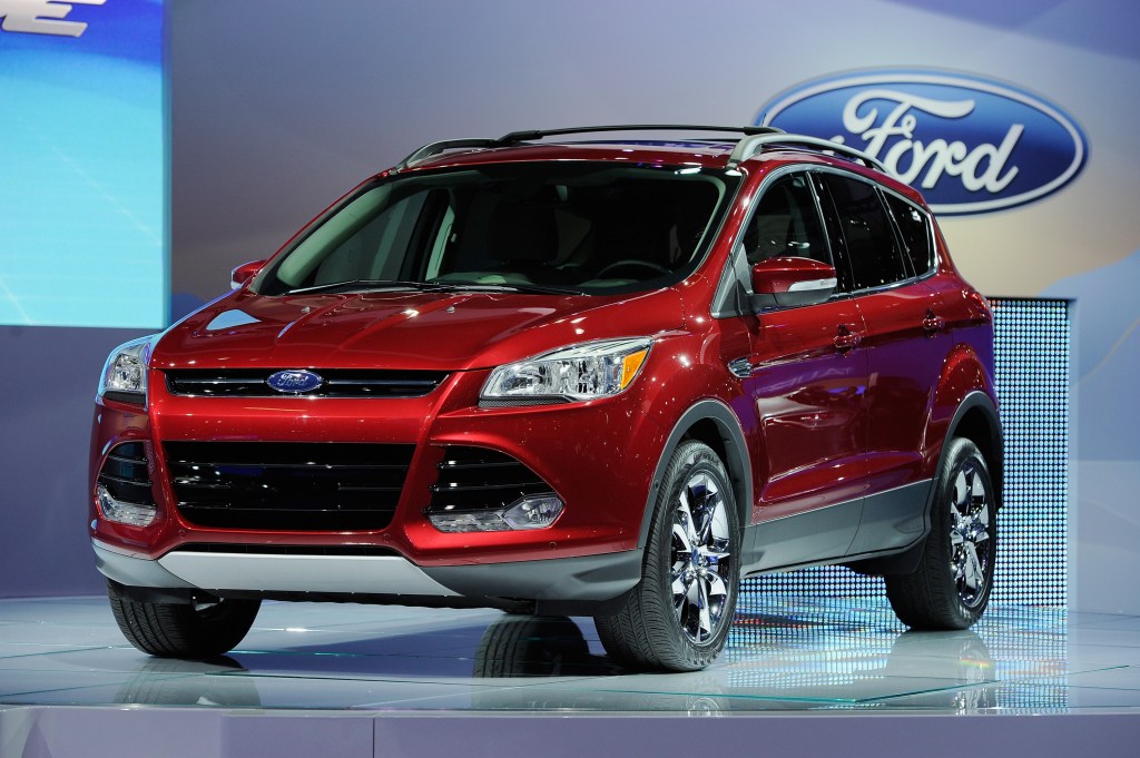 A 2011 Ford Escape SUV on display at an auto show