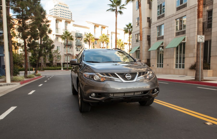 2013 Nissan Murano driving through the city