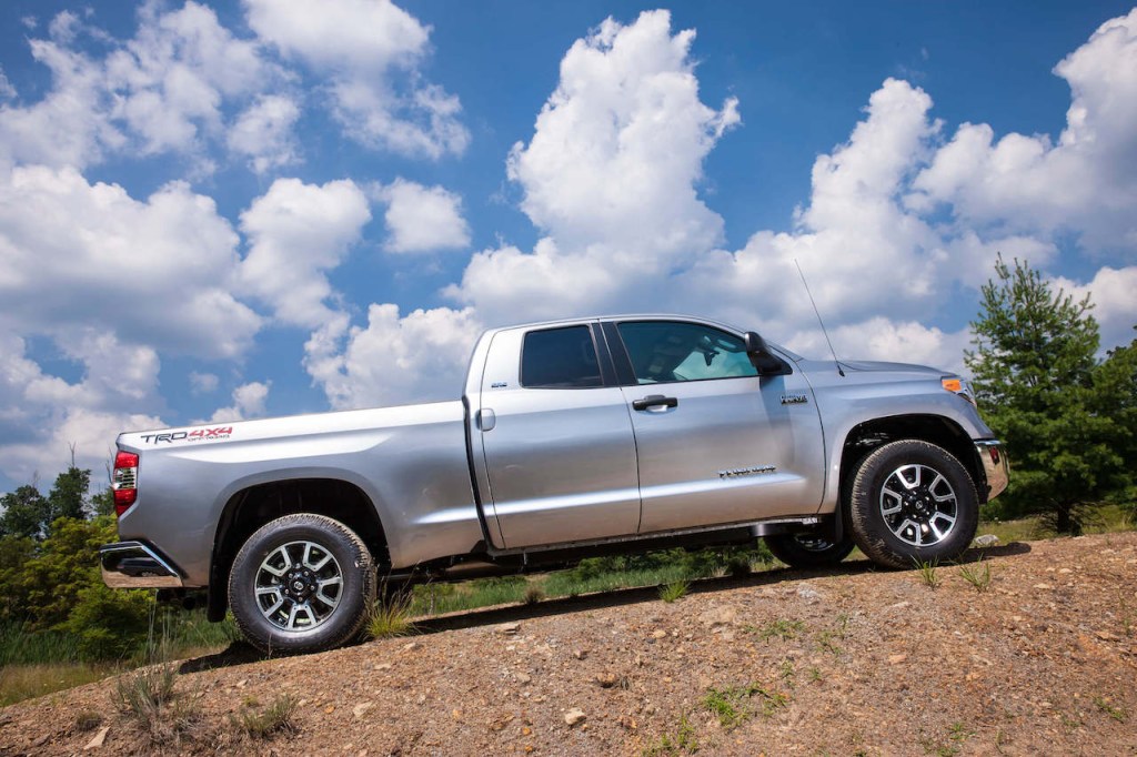 a silver 2015 Toyota Tundra climbing a hill is one of the best reliable used pickup trucks