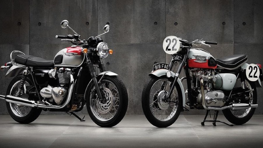 A white-and-red 2016 Triumph Bonneville T120 next to a red-and-white 1959 Triumph Bonneville T120
