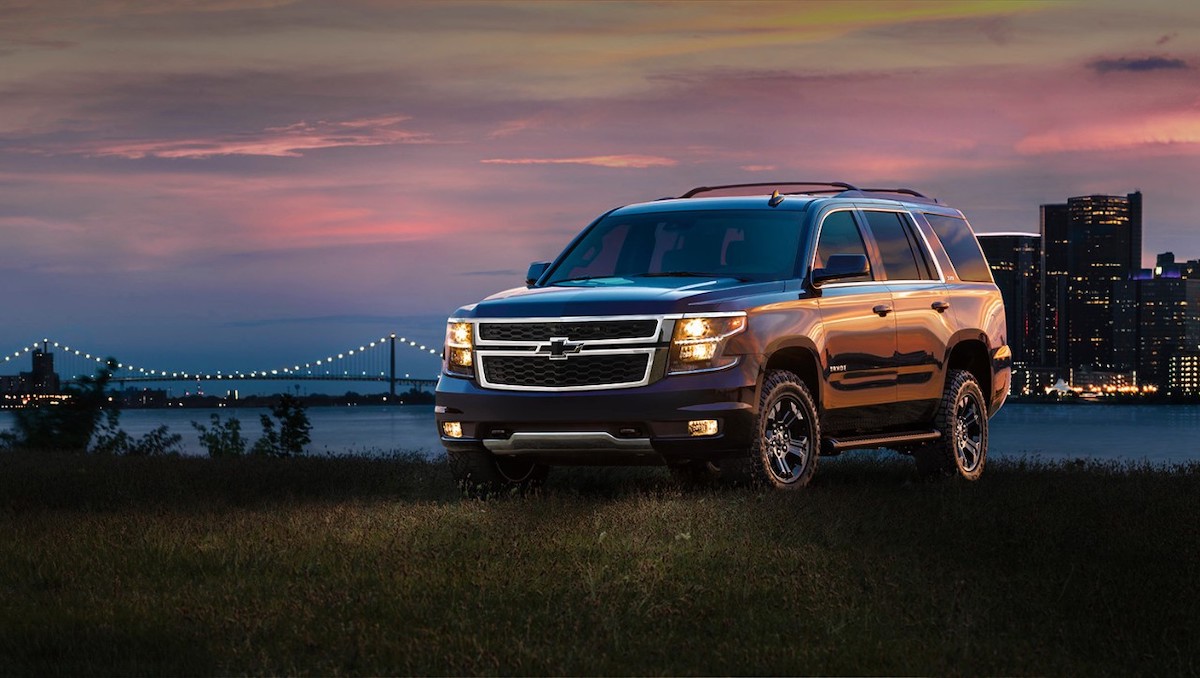 2017 Chevrolet Tahoe parked with a bridge in the distance