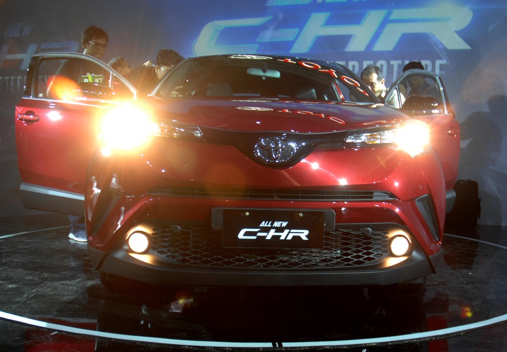 A Toyota C-HR on display at an auto show