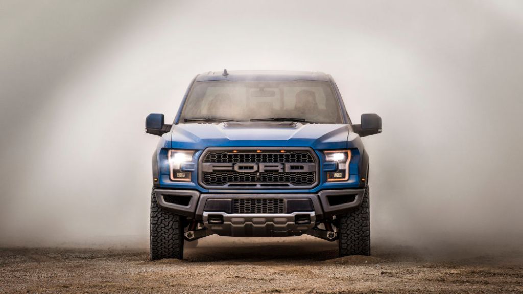 2019 Ford Raptor emerging from dust