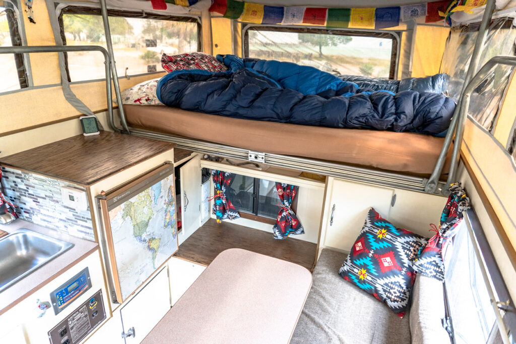 The living space inside Trazan's pop-up truck camper