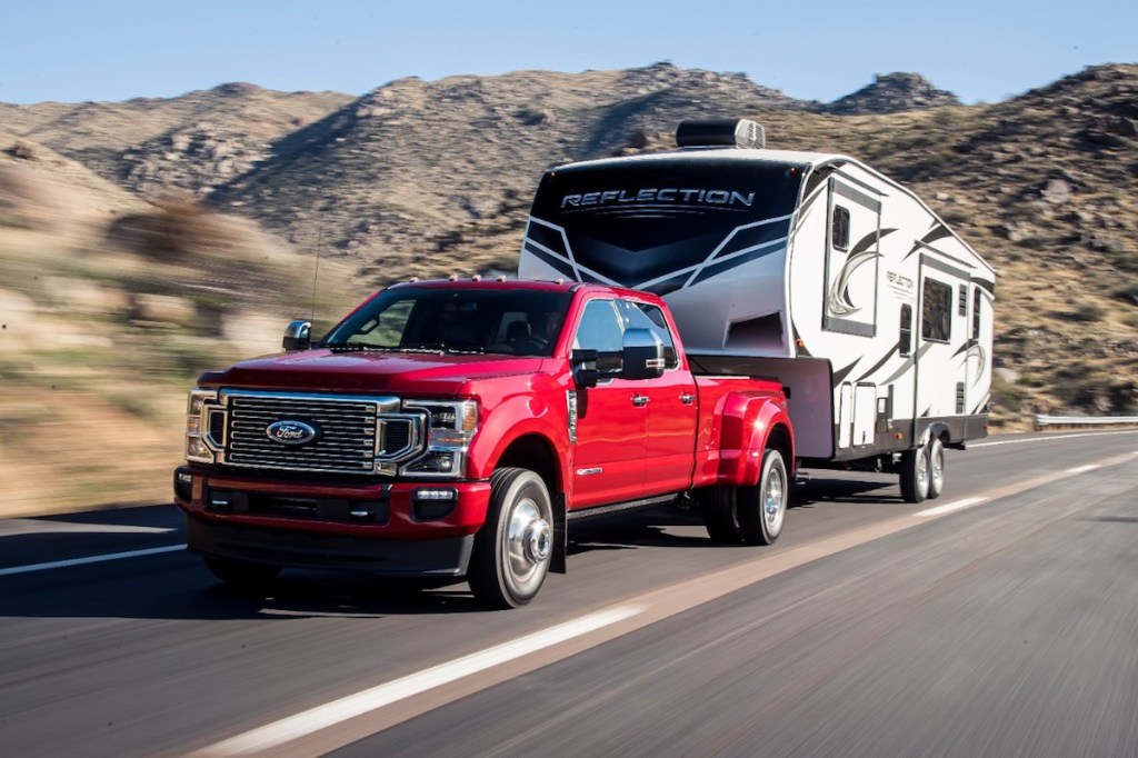 Red 2020 Ford F-250 pulling RV