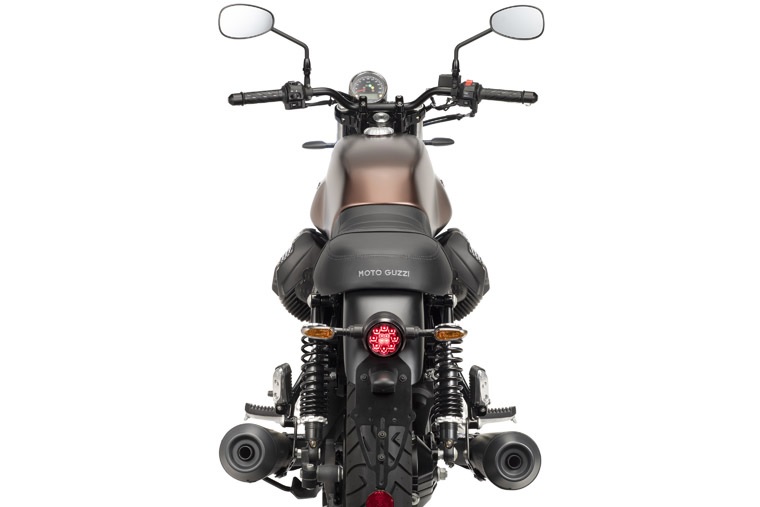 The rear view of a brown-tanked 2020 Moto Guzzi V7 III Stone Night Pack