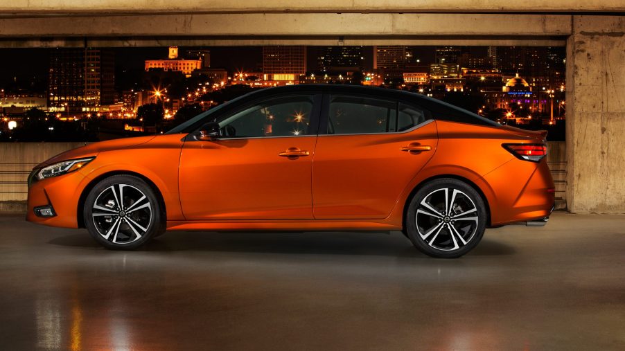 2020 Nissan Sentra with an orange glow city behind it