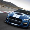 A blue-with-white-stripes 2020 Shelby American Ford Mustang GT500 Special Edition on a racetrack