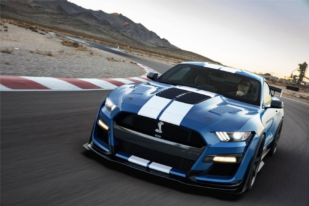 A blue-with-white-stripes 2020 Shelby American Ford Mustang GT500 Special Edition on a racetrack