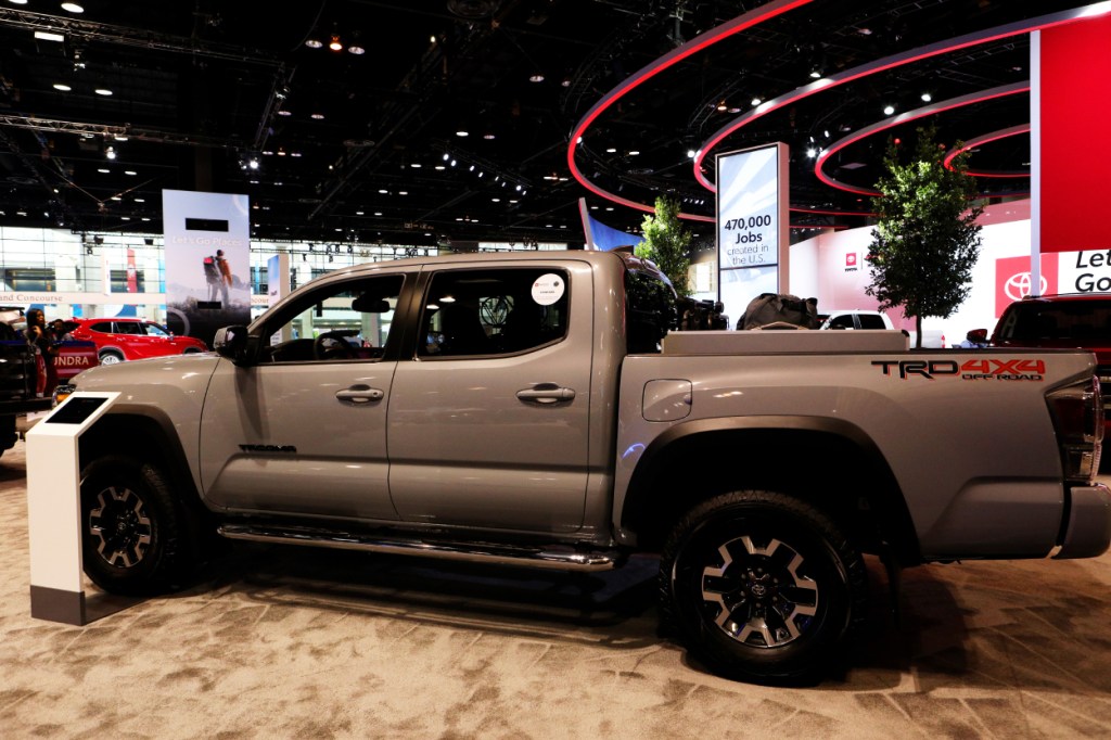 A new Toyota Tacoma on display at an auto show