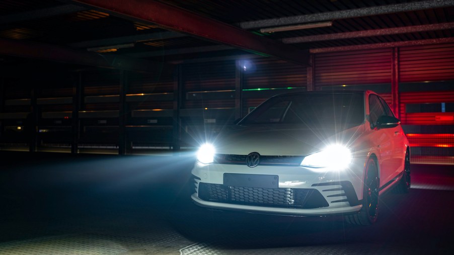 2020 Volkswagen Golf with the headlights on at night
