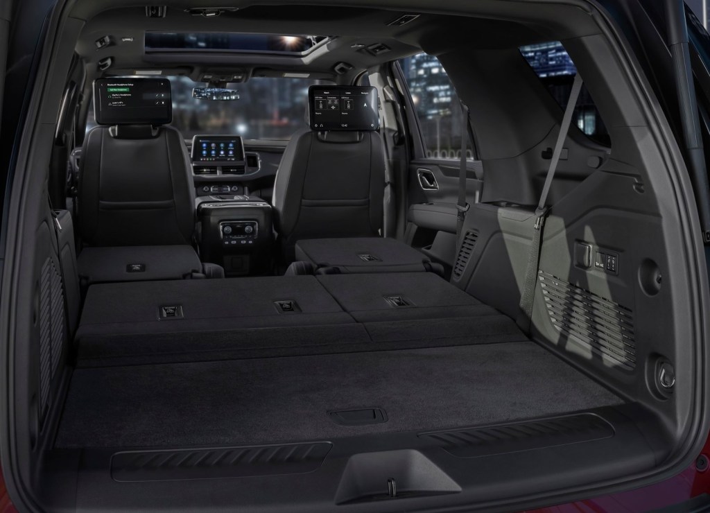 The 2021 Chevy Tahoe's interior and rear cargo area, with the 2nd- and 3rd-row seats folded