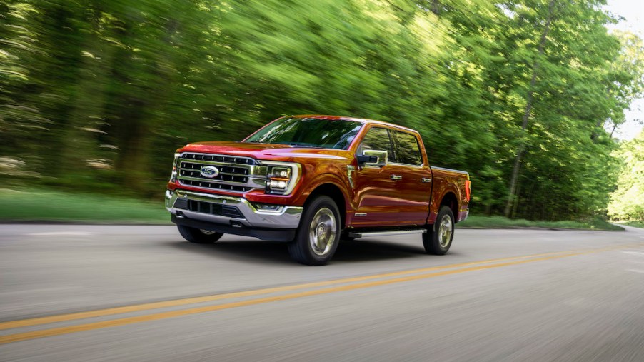 2021 Ford F-150 driving through a forest