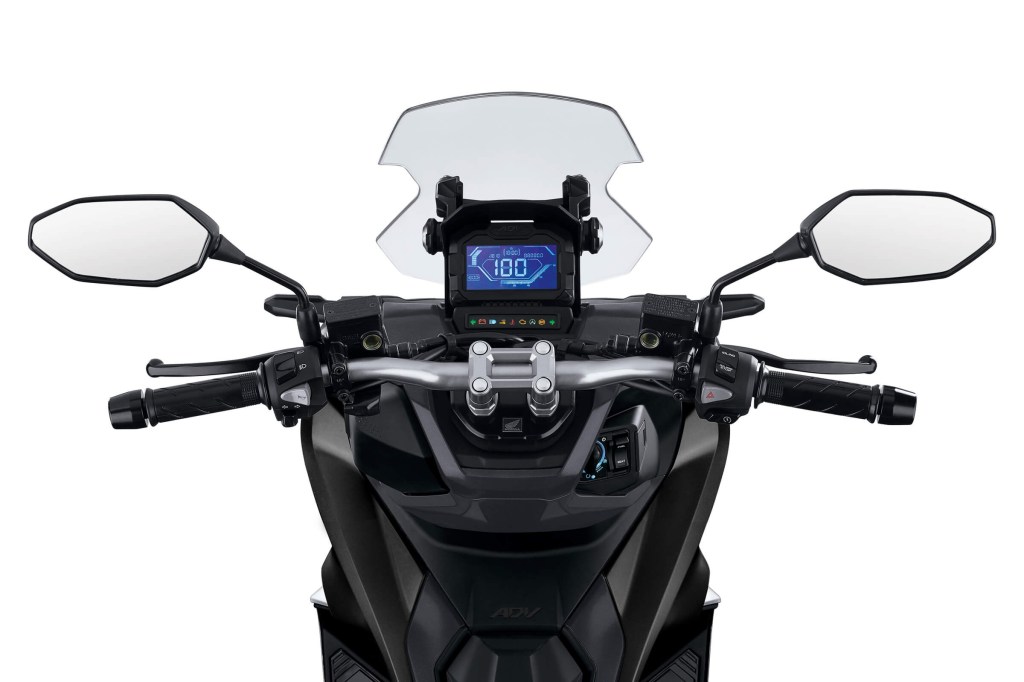 The 2021 Honda ADV150's handlebars and blue-lit digital display