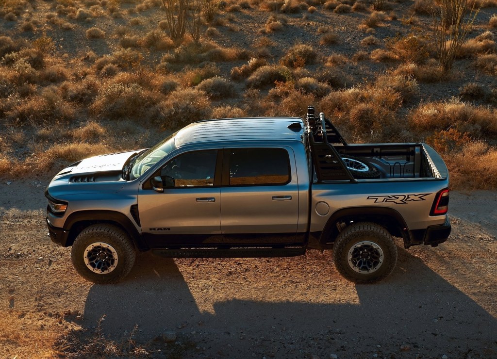 An overhead side view of a silver 2021 Ram 1500 TRX Launch Edition in the desert