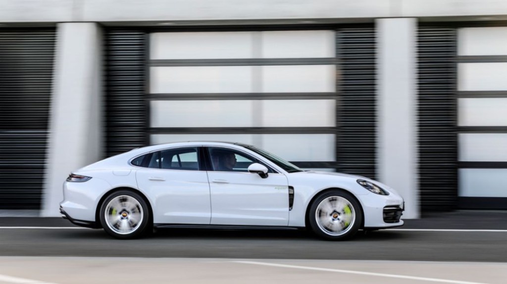 A white 2021 Porsche Panamera on the track.