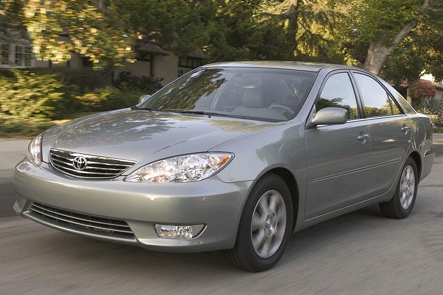 2006 Toyota Camry on a shady street is a great example of a good used car under $5,000