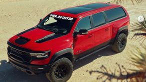 A red Ram 1500 Crew Cab has been rendered with a seamless hardtop extending back to the tailgate.