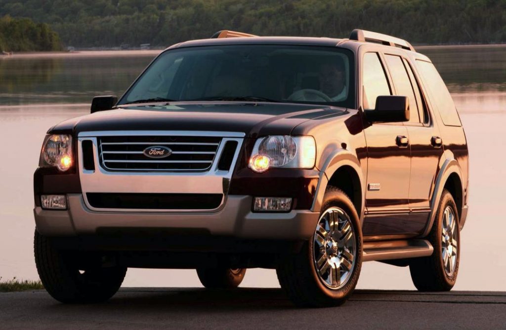 2006 Ford Explorer in serene lighting near a still body of water