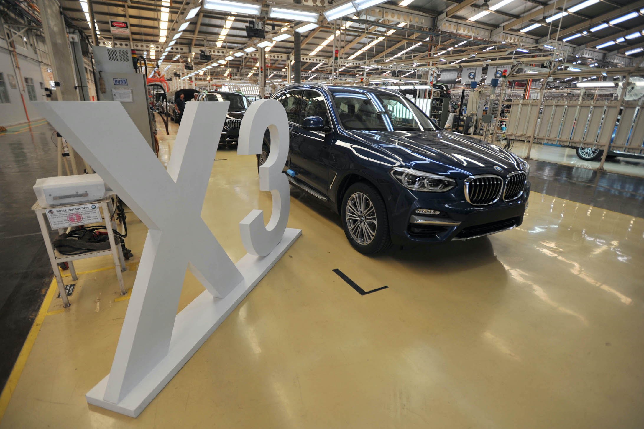Workers assembly BMW X3, rival to the Lincoln Corsair, at PT Gaya Motor manufacture in Jakarta, Indonesia on July 18, 2018
