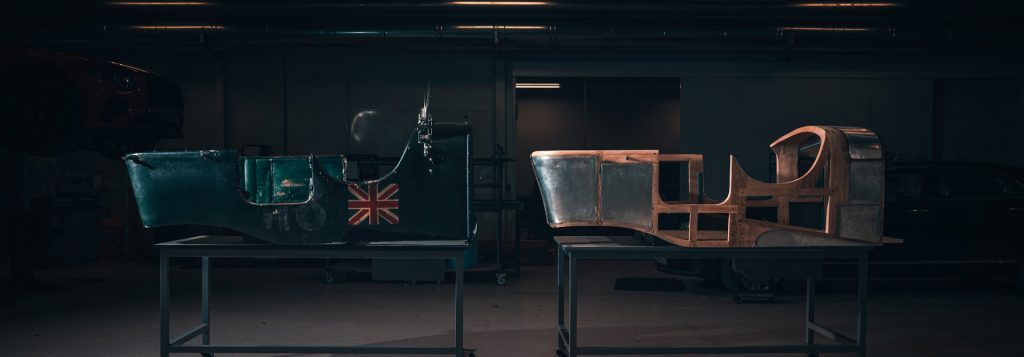 The continuation Blower Bentley's green aluminum body and ash-wood frame on separate tables