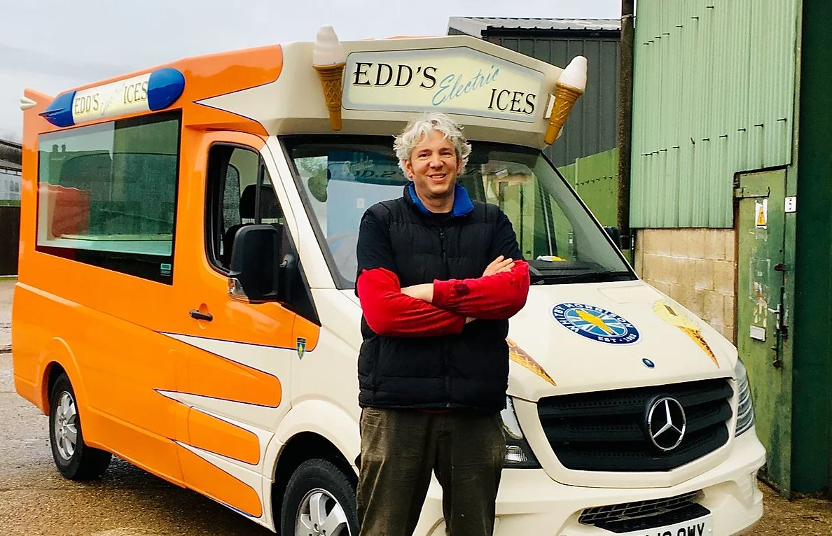 Edd China, former co-host of the Wheeler Dealer television show stands before his EV ice cream truck.
