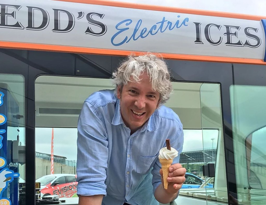 Edd China, former co-host of the Wheeler Dealer television show serves ice cream from his EV van.