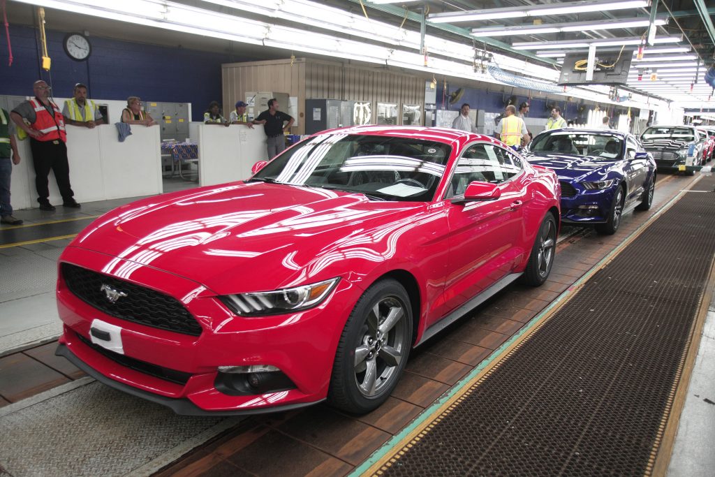 An assembly line of Ford Mustang GT cars