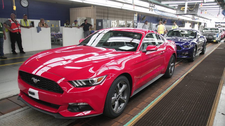 An assembly line of Ford Mustang GT cars