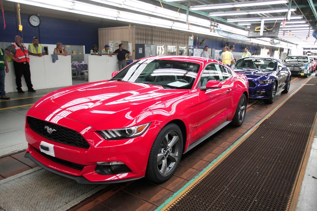 An assembly line of Ford Mustang GT cars