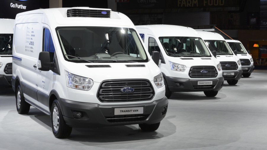 Ford Transit vans on display at an auto show