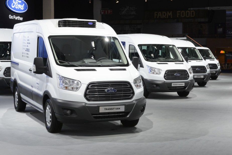 Ford Transit vans on display at an auto show