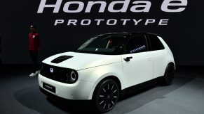 A Honda e prototype on display at an auto show