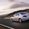 Toyota Corolla 2007 model year rear view driving in the country