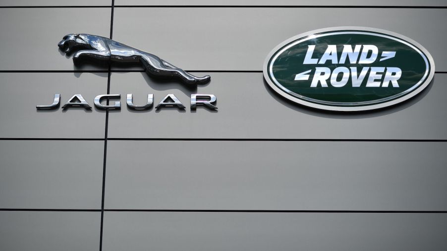 A logo is pictured outside a Jaguar Land Rover new car show room in Tonbridge, south east England