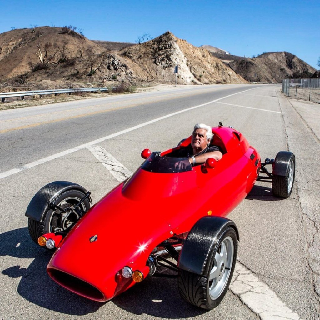 Jay Leno in his Light Car Company Rocket on a California mountain road