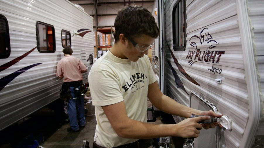 Workers at Jayco, Inc., the country's third largest maker of recreational vehicles, build Jay Flight travel trailers