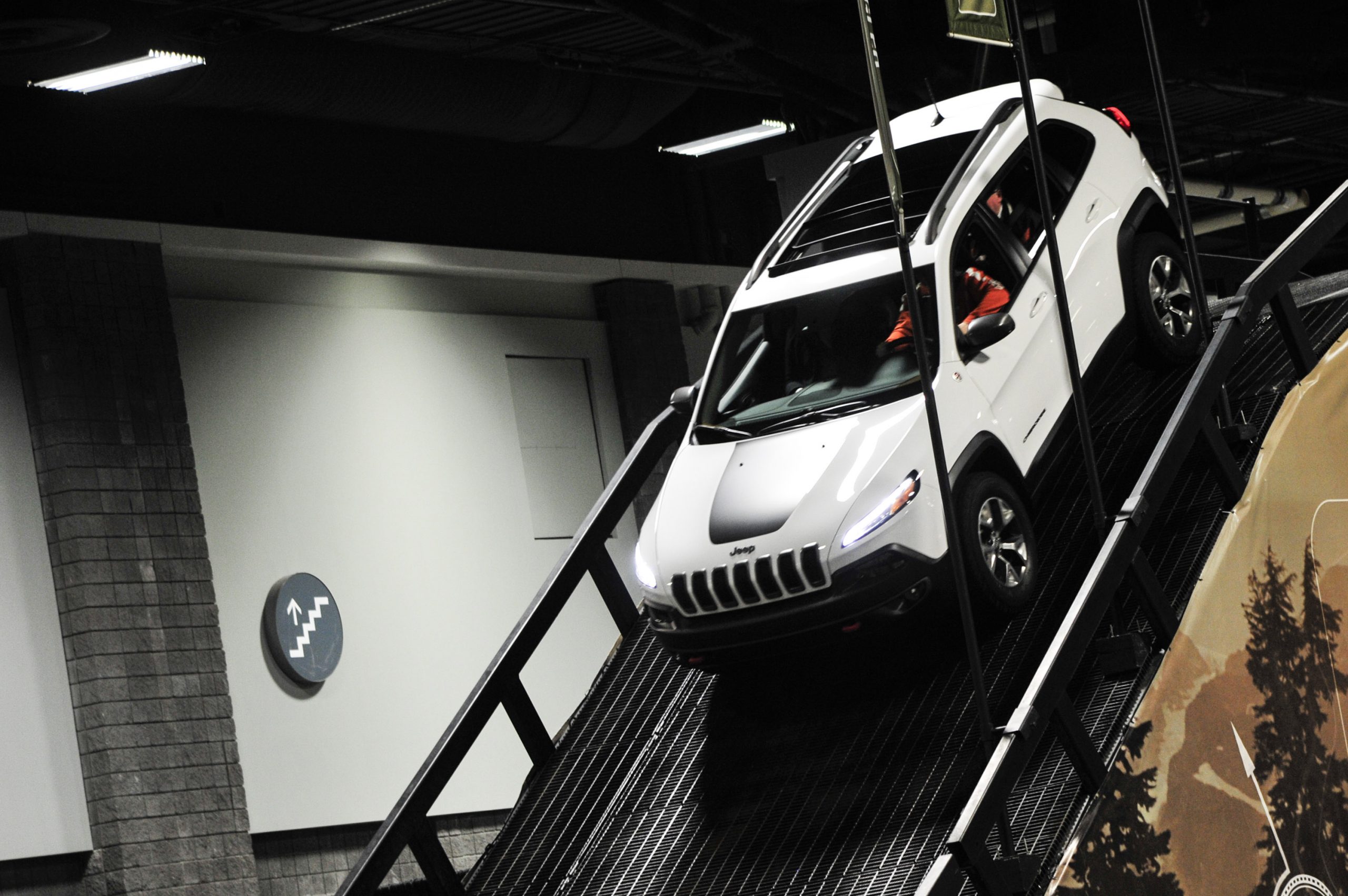 A Jeep Compass on display at an auto show