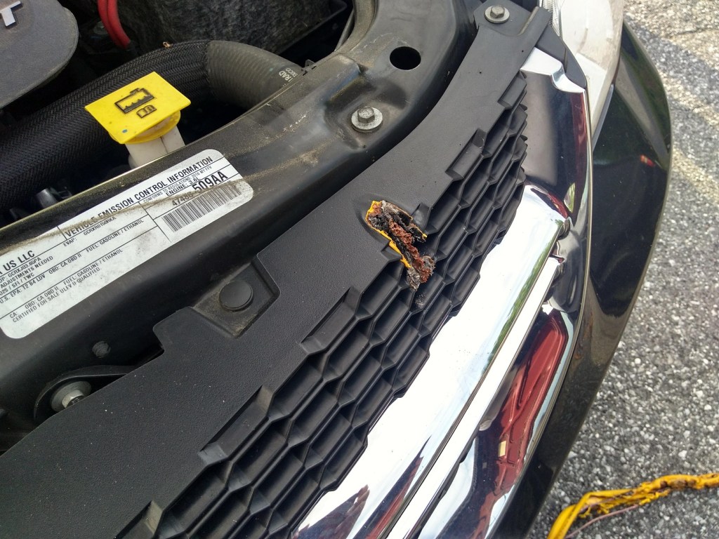 The grille on a minivan melted after jumper cables that were attached to the wrong battery terminals melted