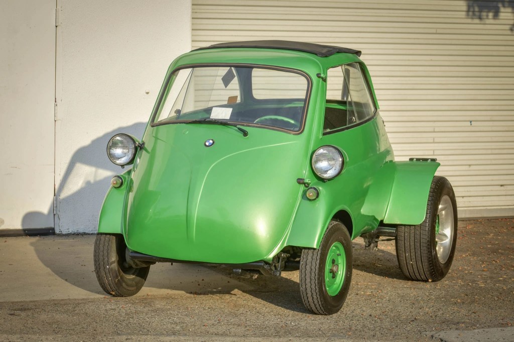 A green 1957 BMW Isetta with a Beetle engine