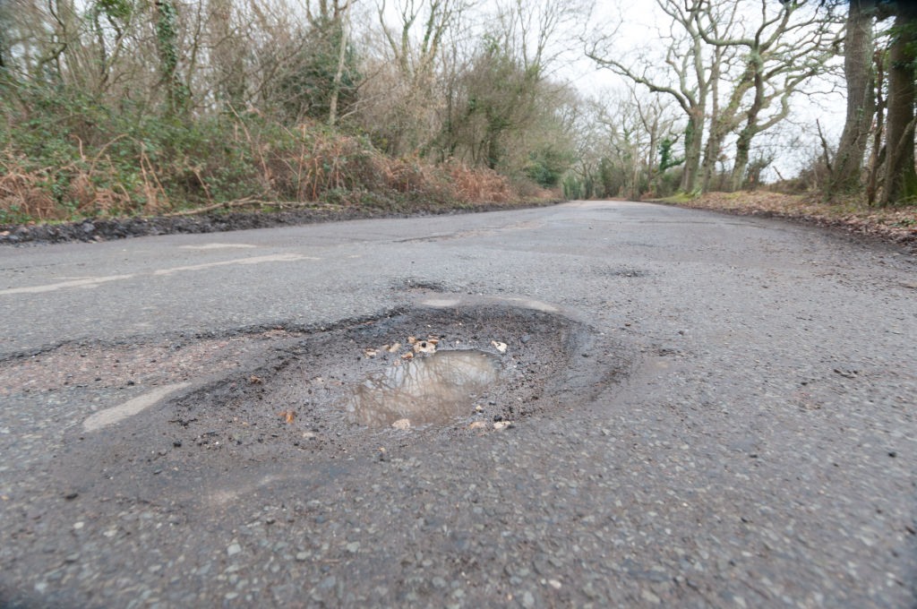 Pot holes in road surface 2017. (Photo by National Motor Museum/Heritage Images via Getty Images)