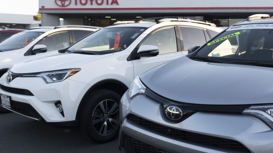 Toyota SUVs on display at a car dealership