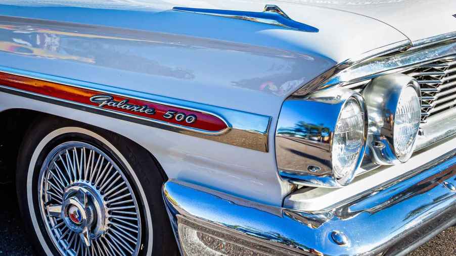 The right front corner of a Ford Galaxie is shown in close up the same car the Manson family used
