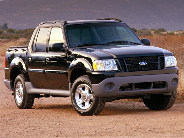 a black Ford Explorer sport trac in a press photo from 2001