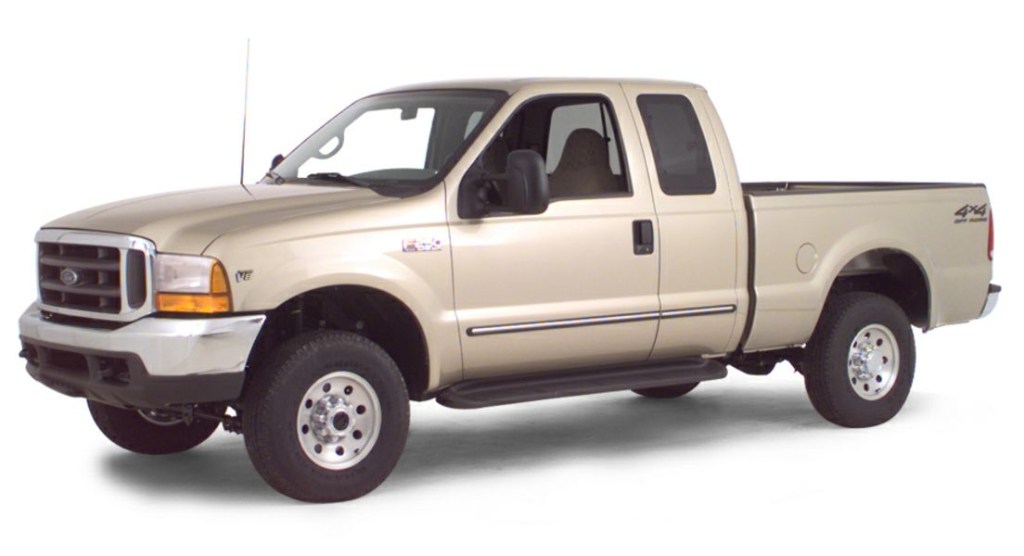 press photo against a white backdrop gold Ford F-250 diesel pickup truck