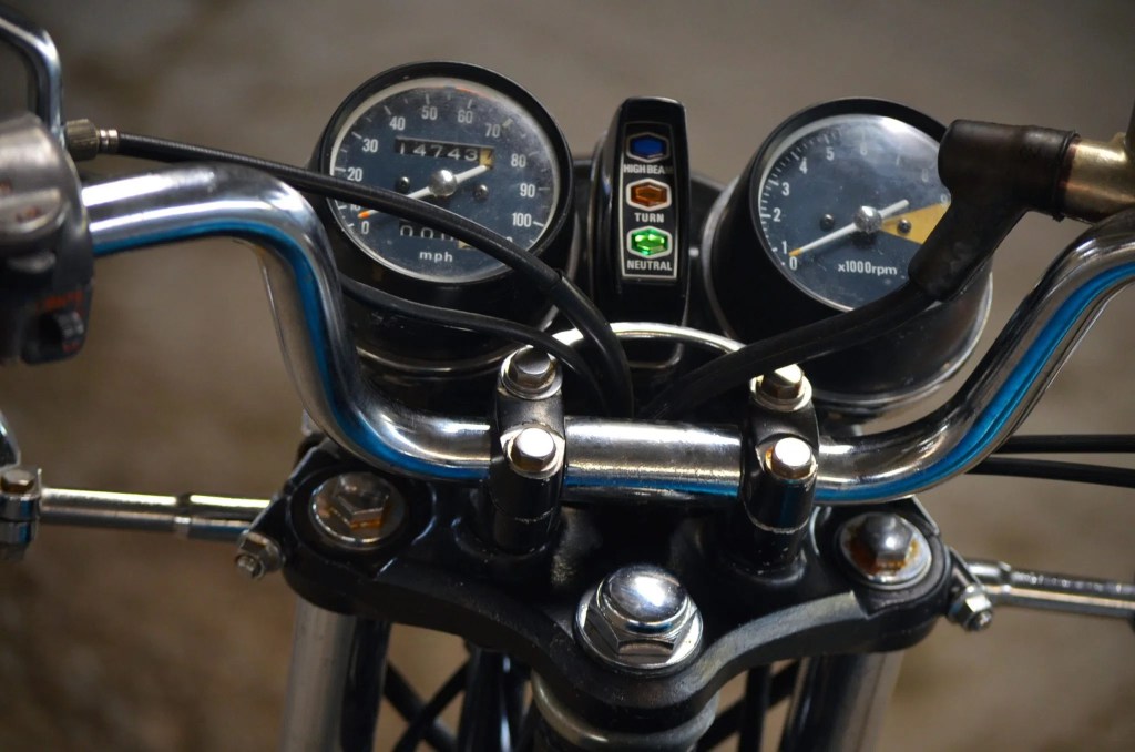 The gauges and lights of a 1975 Honda CB360T