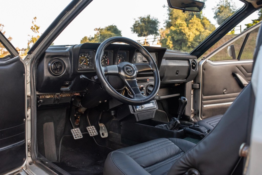 The black interior of a 1983 Alfa Romeo GTV6