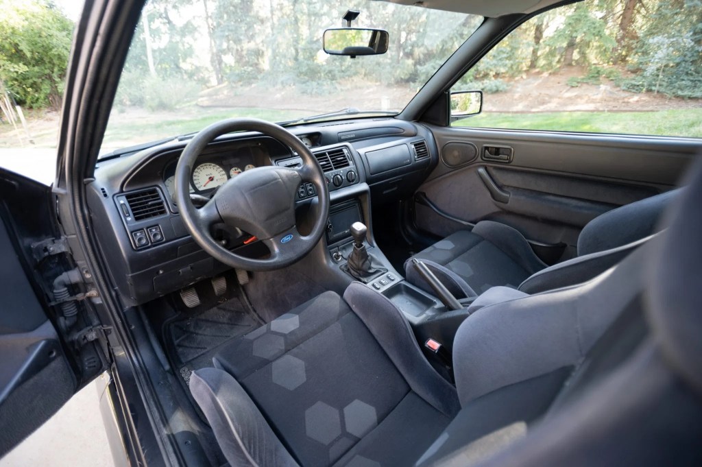 The 1994 Ford Escort RS Cosworth's interior, with gray Recaro sport seats