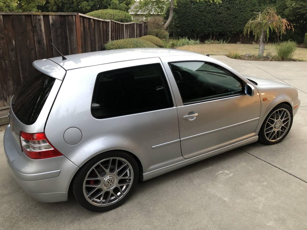 An overhead rear 3/4 view of a silver 2002 Volkswagen Golf GTI 337 Edition